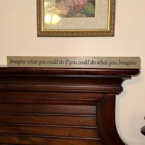 “Imagine what you could do if you could do what you Imagine” green black sign